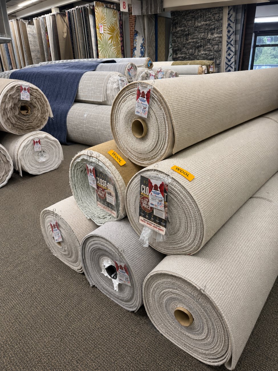 Wool berber rolls in the Kas Carpet warehouse